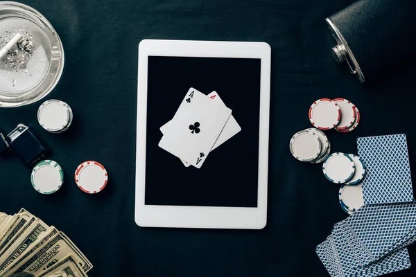 Multi-game dashboard showing live roulette and slot game thumbnails